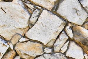 textura de parede de pedra de alvenaria foto