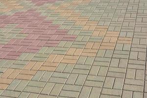 plano de fundo multicolorido de lajes de pavimentação em uma rua da cidade.