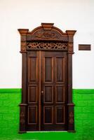 detalhe do uma lindo fachada do a casas às a histórico centro da cidade do a herança Cidade do salamina localizado às a Caldas departamento dentro Colômbia. foto