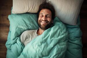 ai gerado a partir de a aéreo perspectiva, uma homem mentiras dentro cama debaixo uma turquesa cobertor, com dele cabeça em repouso em coordenando almofadas foto