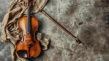 clássico violino e arco em repouso em texturizado fundo foto