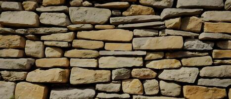 textura de uma parede de pedra. antigo fundo de textura da parede de pedra do castelo. foto