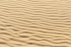areias do serenidade abraçando a beleza do natural motivo areias, uma tranquilo tapeçaria do da terra padrões foto