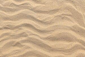 areias do serenidade abraçando a beleza do natural motivo areias, uma tranquilo tapeçaria do da terra padrões foto