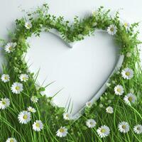uma branco em forma de coração quadro, Armação em repouso em uma fundo do exuberante verde Relva e delicado flores foto