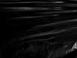 fundo de sobreposição de textura de filme plástico transparente preto. plástico realista para design de pôster e efeito de sobreposição de fotos. padrão de superfície de plástico enrugado para fontes e elementos de design gráfico. foto