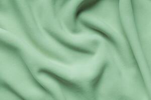 suave verde lã textura, uma acolhedor fundo. foto