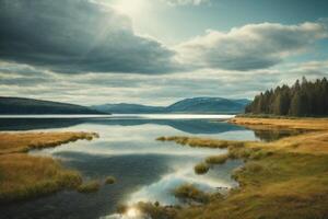 uma lago cercado de árvores e Relva às nascer do sol foto