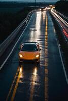 uma Esportes carro dirigindo em uma molhado estrada às noite foto