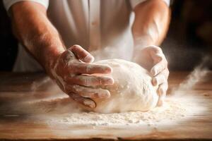 a chef viril mãos amassar a massa. foto