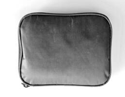 bolsa ou saco tecido com cinzento cor em branco fundo foto