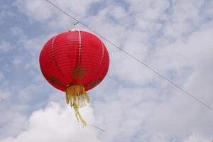 chinês Novo ano lanterna. traduzir a chinês alfabeto daji dali dentro lanterna que significa rentável comércio foto