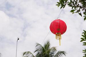 chinês Novo ano lanterna. traduzir a chinês alfabeto daji dali dentro lanterna que significa rentável comércio foto