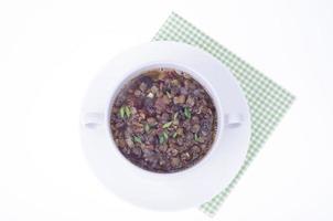 sopa vegetariana grossa com vegetais e lentilhas foto