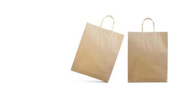 Castanho papel saco compras bolsas isolado em branco fundo foto