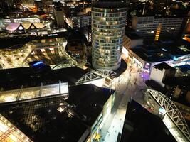 aéreo noite Visão do iluminado cidade Centro edifícios do Birmingham central cidade do Inglaterra Unidos reino. marcha 30, 2024 foto