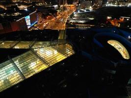 aéreo noite Visão do iluminado cidade Centro edifícios do Birmingham central cidade do Inglaterra Unidos reino. marcha 30, 2024 foto
