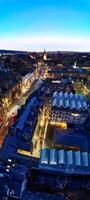 aéreo panorâmico Visão do iluminado histórico Oxford central cidade do Inglaterra às noite. Inglaterra Unidos reino. marcha 23, 2024 foto