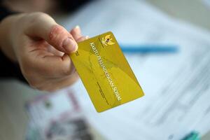 indonésio dourado social segurança cartão originalmente chamado kartu Perlindungan sosial foto