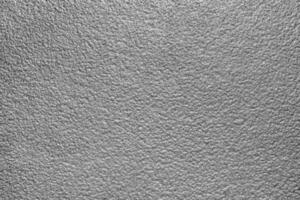 monocromático textura do brilhante granulado metal. abstrato fundo. foto
