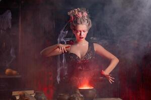 dia das Bruxas bruxa com caldeirão. lindo jovem mulher conjurando, fazer feitiçaria foto