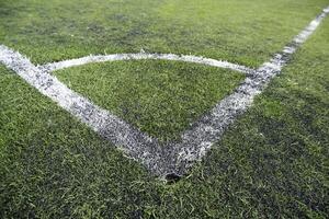 canto em uma futebol campo foto