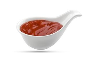 ketchup dentro tigela isolado em branco foto