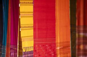 colorida tai lue tecido tecido a partir de norte do Tailândia foto