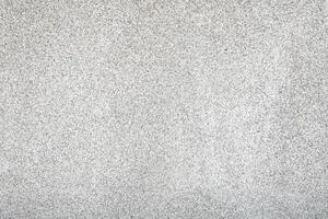 terrazzo desatado muro. cascalho chão textura e fundo foto