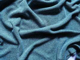 textura e fundo do azul roupa de esporte tecido futebol camiseta foto