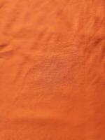 laranja tecido fundo, sedoso gradiente luxo tecido textura, verão têxtil bandeira material tropical onda Veja moda abstrato Projeto poster modelo foto