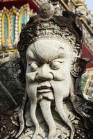 wat pho pedra guardião estátua, Tailândia foto