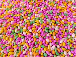 açúcar revestido colorida funcho sementes fundo - colorida doce fundo foto