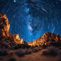 estrelas Seguindo dentro a noite céu sobre uma silencioso deserto foto