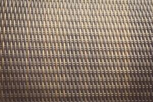 sintético rattan textura tecelagem fundo Como usava em ao ar livre jardim mobiliário. foto