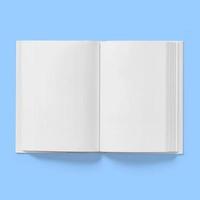 de volta ao conceito de escola, capa dura em branco livro branco meio aberto isolado em azul. foto