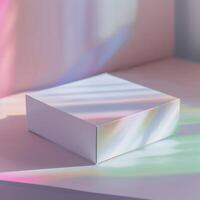 a mínimo produtos fotografia do uma branco caixa com uma sutil arco Iris reflexão em Está superfície. foto