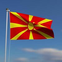 Macedônia bandeira é acenando dentro frente do uma azul céu com borrado nuvens dentro a fundo foto