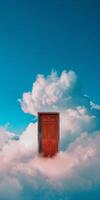 misterioso vermelho porta flutuando entre nuvens dentro uma Claro azul céu foto