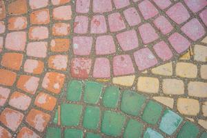 fundo natural de pedras de pavimentação multicoloridas foto