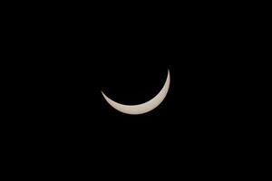 total solar eclipse - lua sobre Sol depois de totalidade foto