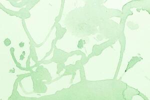 aguarela verde salpicos diluição pontos fundo. foto