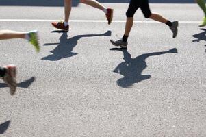 maratona corredores corrida em asfalto foto