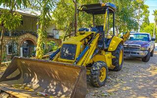 porto escondido Oaxaca México 2023 amarelo escavadora com pá dentro porto escondido México. foto