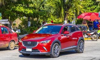 porto escondido Oaxaca México 2022 vermelho moderno carro veículo transporte dentro a cidade Cidade México. foto