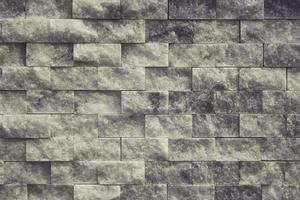 abstrato cinza pedra quadrada parede realista textura ornamento edifício rocha na natureza. foto