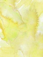 aquarela amarela abstrata pintada textura grunge gradiente com manchas e respingos de tinta de mão em branco. foto