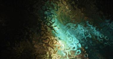 ondas de superfície abstratas artísticas debaixo d'água com raios de bolhas separados brilhando natural escuro. foto