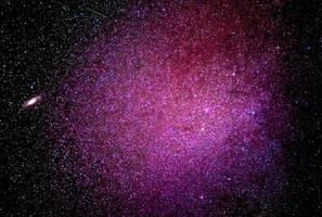 plano de fundo de galáxias abstratas com estrelas e planetas com motivos rosa de estrelas do universo noturno foto