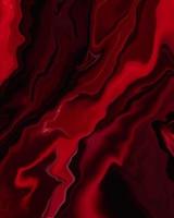 coleção de textura de mármore em vermelho escuro. padrão suave em retrato para criar um design bonito. líquido fluindo abstrato para um projeto criativo. foto